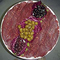 Platter of sliced SUPRI and Olives